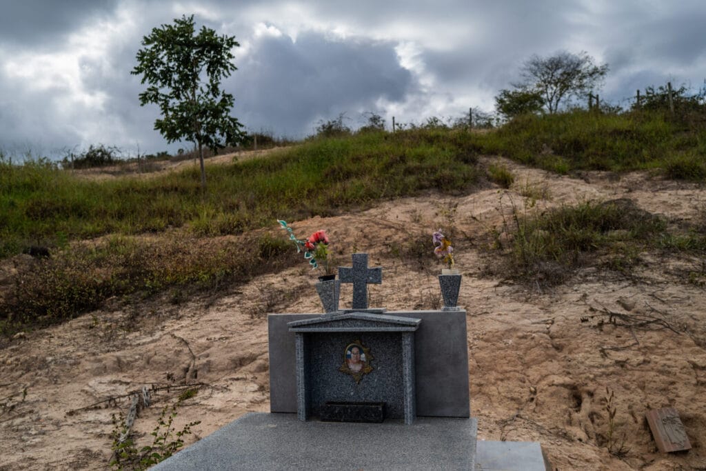 A cemetery showing the gravestone of a victim killed in the Mariana dam disastr